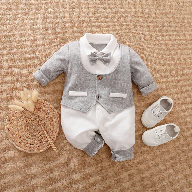 A set of baby autumn clothing featuring a wine red and white striped romper with long sleeves, a white shirt, and a bow tie. Accompanied by white baby shoes and a frame for a photo.