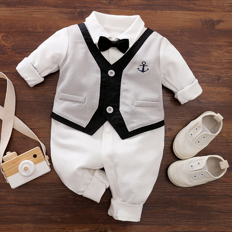 A set of baby autumn clothing featuring a wine red and white striped romper with long sleeves, a white shirt, and a bow tie. Accompanied by white baby shoes and a frame for a photo.
