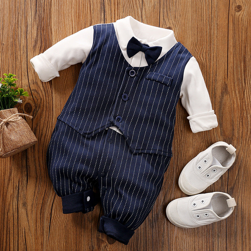A set of baby autumn clothing featuring a wine red and white striped romper with long sleeves, a white shirt, and a bow tie. Accompanied by white baby shoes and a frame for a photo.