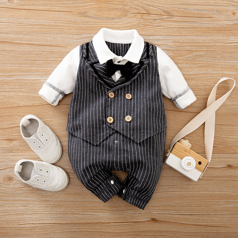 A set of baby autumn clothing featuring a wine red and white striped romper with long sleeves, a white shirt, and a bow tie. Accompanied by white baby shoes and a frame for a photo.