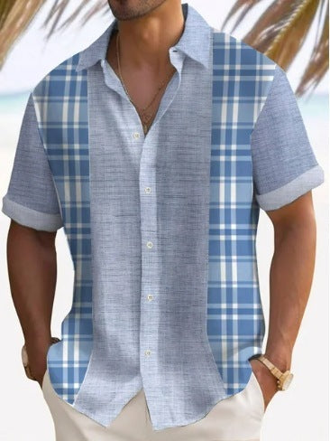 A man wearing a short-sleeved, striped beach shirt in white and blue colors