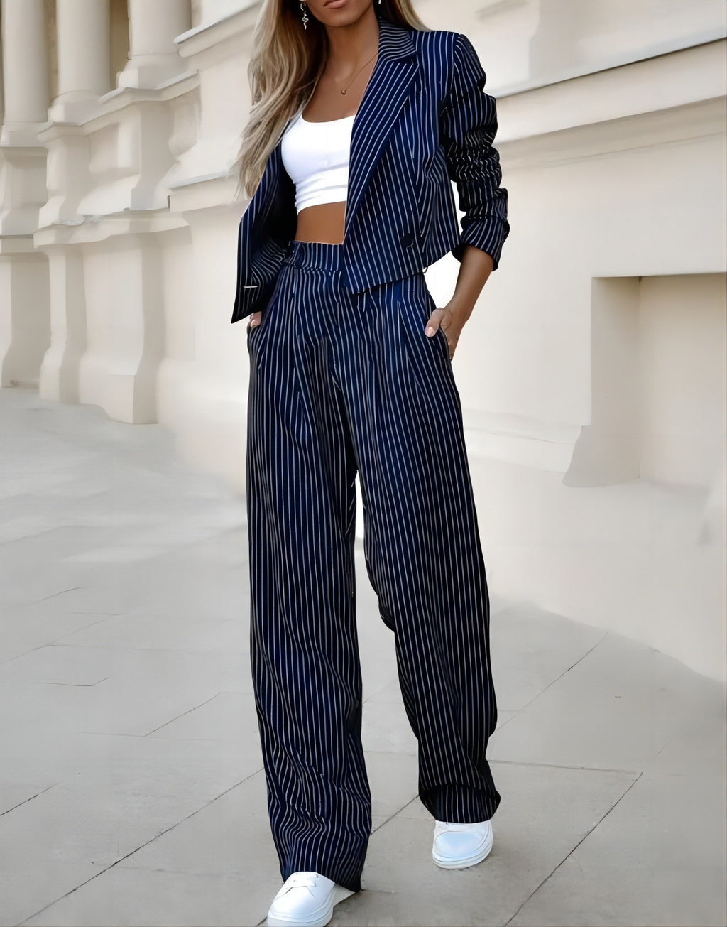 Multiple images of women's spring fashion striped suits in various colors featuring a long-sleeved crop top and straight pants. 