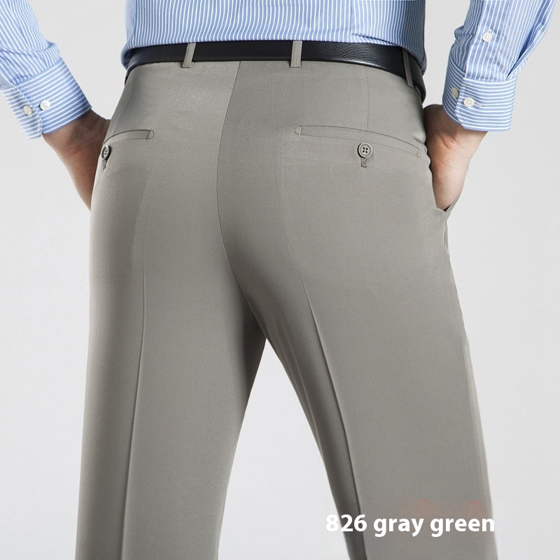 Three pairs of men's suit pants in white, blue, and gray colors, displayed side by side against a white background.