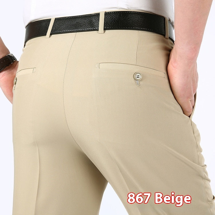 Three pairs of men's suit pants in white, blue, and gray colors, displayed side by side against a white background.