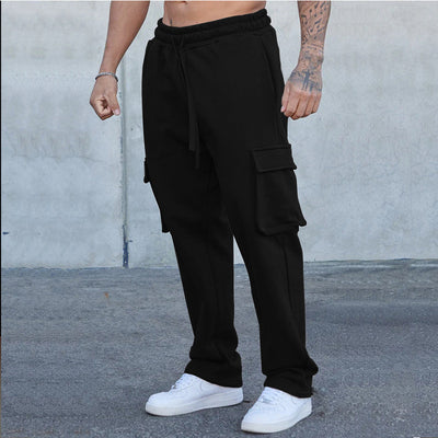A pair of men's straight-leg trousers with multi-pocket design and drawstring waist in a black color.