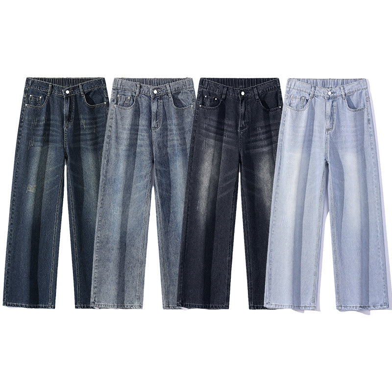 A pair of men's straight-leg jeans in a vintage blue and black gray color.