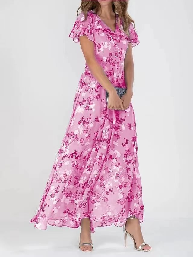 A model wearing a floral print, short sleeve, V-neck, A-line, maxi dress in blue, with additional color options shown on the side.
