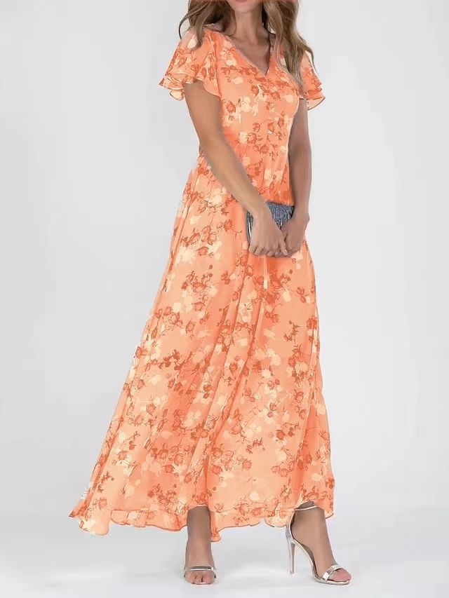 A model wearing a floral print, short sleeve, V-neck, A-line, maxi dress in blue, with additional color options shown on the side.